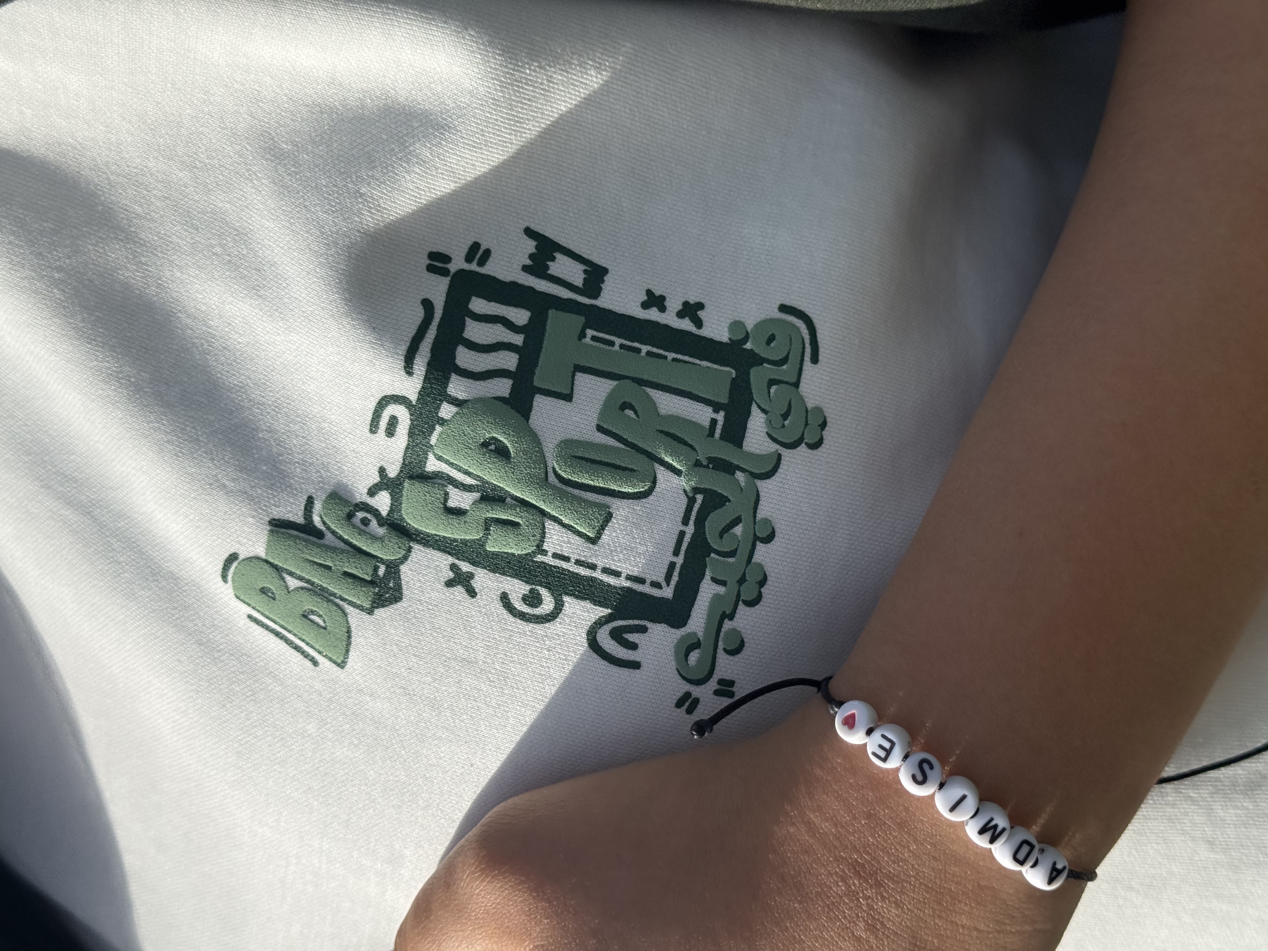 T-shirt “متمكن” White-Dark green